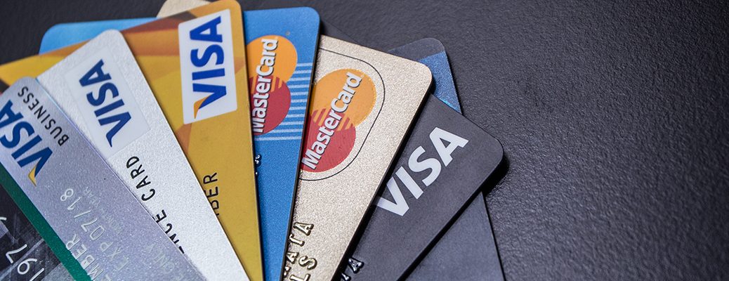 Credit cards from RuPay, Visa, Mastercard, and AMEX, highlighting provider differences. Explore features with IndusInd Bank.