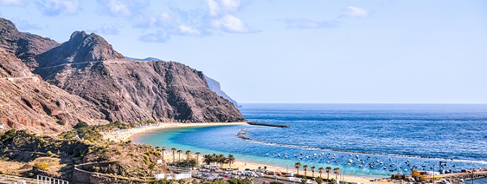 Explore Spain's stunning beaches with ease. Use an IndusInd Bank Personal Loan for travel and make your dream trip a reality.