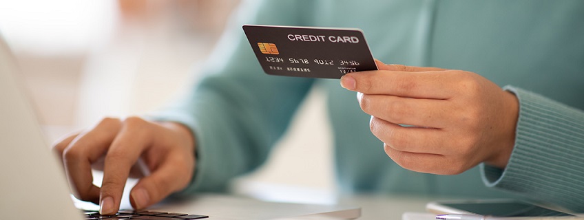 Person Holding IndusInd Bank Lifetime Free Credit Card with no Annual Fee