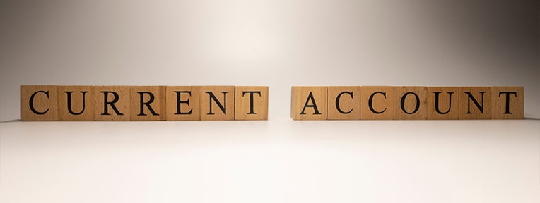 Why do sole proprietors in India generally use a current account